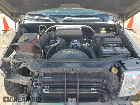 2006 Jeep Commander with VIN 1J8HG48K06C319278, listed as a Copart auction lot 60560225 with 122,920 mi miles and Salvage title. Bid and sale history available at DreamBid. Image 12.