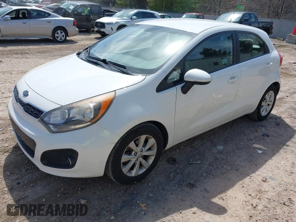 2012 Kia Rio EX with VIN KNADN5A37C6031494, listed as a IAAI auction lot 42052186 with 141,765 mi miles. Bid and sale history available at carsss.com. Image 17.