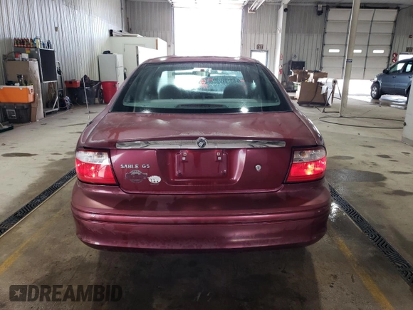 2004 Mercury Sable GS z VIN 1MEFM50U74A624472, wystawiony jako Copart lot #49885305 z przebiegiem 115 247 mil mil oraz Szkoda całkowita • Salvage title. Historia ofert i sprzedaży dostępna na DreamBid. Obrazek 6.