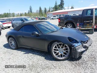 2014 Porsche 911 Carrera z VIN WP0CA2A94ES140857, wystawiony jako IAAI lot #42159010 z przebiegiem 46 230 mil mil oraz . Historia ofert i sprzedaży dostępna na DreamBid. Obrazek 14.
