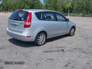2009 Hyundai Elantra Touring with VIN KMHDC86E99U035163, listed as a IAAI auction lot 42049897 with 123,559 mi miles and . Bid and sale history available at DreamBid. Image 4.