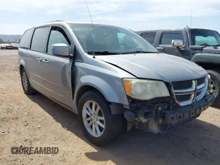 2014 Dodge Grand Caravan SXT with VIN 2C4RDGCG2ER262466, listed as a IAAI auction lot 41928445 with 218,380 mi miles and . Bid and sale history available at DreamBid. Image 1.