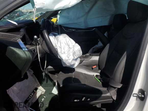 2020 Cadillac XT6 FWD Premium Luxury with VIN 1GYKPCRS8LZ177562, listed as a Copart auction lot 57123195 with Not provided miles and Salvage title. Bid and sale history available at DreamBid. Image 7.
