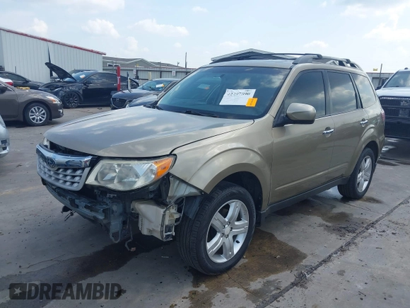 2009 Subaru Forester X Limited z VIN JF2SH64699H745428, wystawiony jako IAAI lot #42407890 z przebiegiem 131 716 mil mil oraz . Historia ofert i sprzedaży dostępna na DreamBid. Obrazek 21.