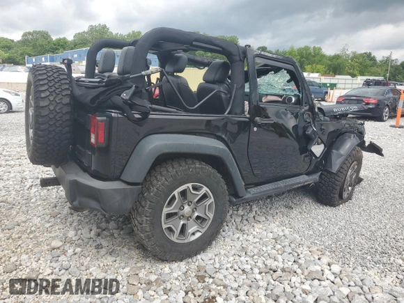 2015 Jeep Wrangler Rubicon with VIN 1C4HJWCG0FL755717, listed as a Copart auction lot 61375435 with 153,207 mi miles and Salvage title. Bid and sale history available at DreamBid. Image 3.