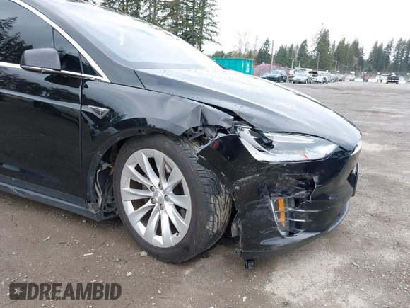 2016 Tesla Model X 70D with VIN 5YJXCBE20GF013046, listed as a IAAI auction lot 41944005 with 94,509 mi miles. Bid and sale history available at carsss.com. Image 6.