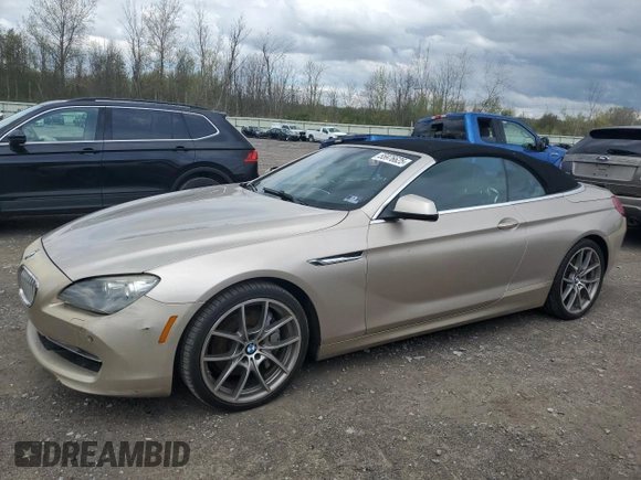 2012 BMW 6 Series 650i z VIN WBALZ3C52CC397545, wystawiony jako Copart lot #55976625 z przebiegiem 147 352 mil mil oraz Tytuł czysty. Historia ofert i sprzedaży dostępna na DreamBid. Obrazek 1.