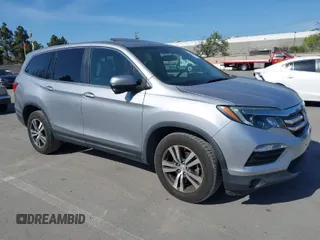 2018 Honda Pilot EX-L with VIN 5FNYF6H58JB058283, listed as a IAAI auction lot 42014331 with 76,676 mi miles. Bid and sale history available at carsss.com. Image 1.