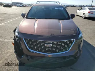 2023 Cadillac XT4 AWD Luxury with VIN 1GYFZBR42PF107893, listed as a Copart auction lot 74989124 with 9,579 mi miles and Salvage Title. Bid and sale history available at carsss.com. Image 5.