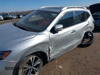 2017 Nissan Rogue SL with VIN JN8AT2MT0HW380062, listed as a IAAI auction lot 41327848 with Not Provided miles and . Bid and sale history available at DreamBid. Image 6.