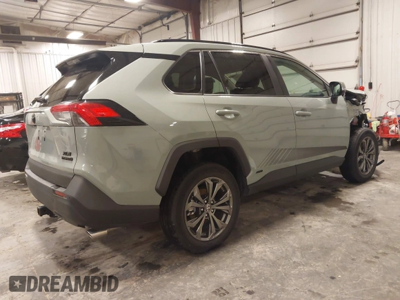 2023 Toyota RAV4 Hybrid XLE Premium z VIN 4T3B6RFV0PU118506, wystawiony jako IAAI lot #41972785 z przebiegiem 16 496 mil mil oraz . Historia ofert i sprzedaży dostępna na DreamBid. Obrazek 4.