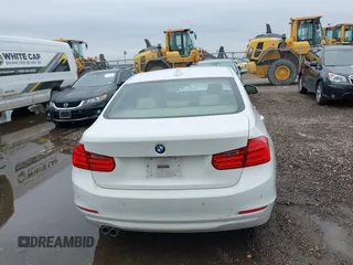2014 BMW 3 Series 328i xDrive with VIN WBA3B5G50ENS06304, listed as a IAAI auction lot 41402704 with 139,943 mi miles. Bid and sale history available at carsss.com. Image 16.