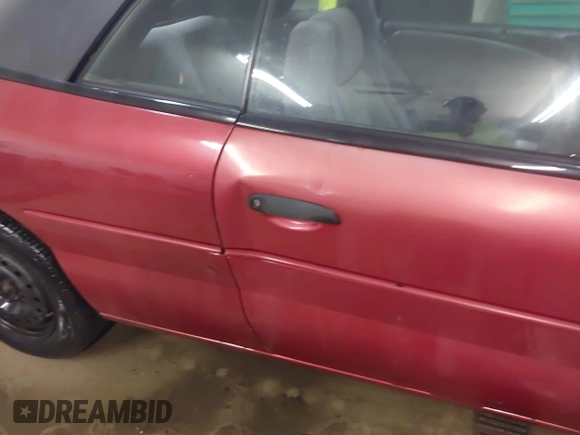 1996 Chrysler Sebring with VIN 3C3EL45X6TT278343, listed as a IAAI auction lot 41743385 with 140,200 mi miles and . Bid and sale history available at DreamBid. Image 6.