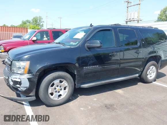 2011 Chevrolet Suburban LT with VIN 1GNSKJE34BR151246, listed as a IAAI auction lot 42520210 with 239,240 mi miles and . Bid and sale history available at DreamBid. Image 2.