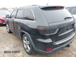 2013 Jeep Grand Cherokee Overland with VIN 1C4RJFCG1DC593890, listed as a IAAI auction lot 41264434 with 204,324 mi miles. Bid and sale history available at carsss.com. Image 3.