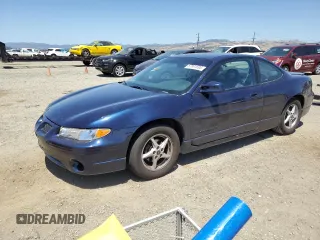 2000 Pontiac Grand Prix GT z VIN 1G2WP12K7YF189639, wystawiony jako Copart lot #57891595 z przebiegiem 70 055 mil mil oraz Tytuł czysty. Historia ofert i sprzedaży dostępna na DreamBid. Obrazek 1.