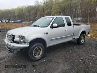 1999 Ford F-150 XL z VIN 1FTRX18L5XNB35835, wystawiony jako Copart lot #52898645 z przebiegiem 218 637 mil mil oraz Szkoda całkowita • Salvage title. Historia ofert i sprzedaży dostępna na DreamBid. Obrazek 1.