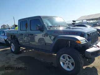 2020 Jeep Gladiator Rubicon with VIN 1C6JJTBG6LL149469, listed as a IAAI auction lot 42224826 with 58,870 mi miles and . Bid and sale history available at DreamBid. Image 14.