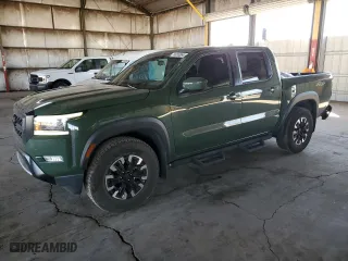 2022 Nissan Frontier PRO-X with VIN 1N6ED1EJ8NN668704, listed as a Copart auction lot 74033864 with 56,198 mi miles and Salvage Title. Bid and sale history available at carsss.com. Image 1.