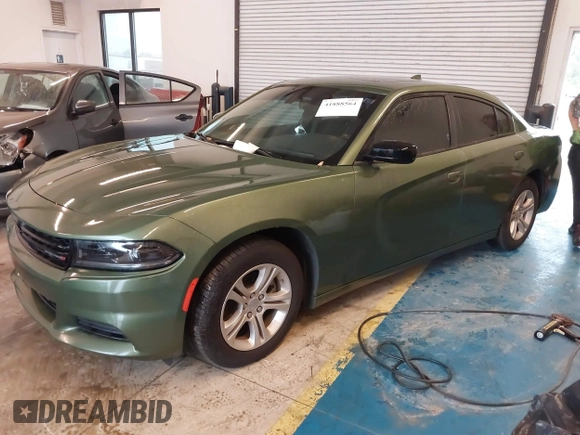 2023 Dodge Charger SXT with VIN 2C3CDXBG2PH698724, listed as a IAAI auction lot 41888564 with 21,717 mi miles and . Bid and sale history available at DreamBid. Image 2.