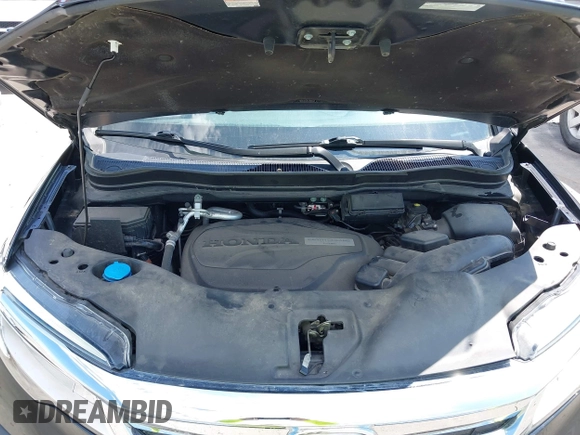 2019 Honda Pilot Touring 7-Passenger with VIN 5FNYF6H67KB031988, listed as a IAAI auction lot 42519588 with 41,368 mi miles and . Bid and sale history available at DreamBid. Image 10.