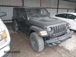 2021 Jeep Wrangler Unlimited Rubicon with VIN 1C4JJXFM6MW538774, listed as a IAAI auction lot 42368651 with 49,490 mi miles and . Bid and sale history available at DreamBid. Image 6.