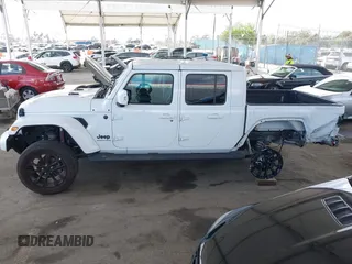 2023 Jeep Gladiator Overland with VIN 1C6HJTFG7PL543870, listed as a IAAI auction lot 42056969 with 28,655 mi miles and . Bid and sale history available at DreamBid. Image 15.