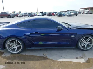 2018 Ford Mustang GT z VIN 1FA6P8CF7J5163016, wystawiony jako IAAI lot #42231330 z przebiegiem 55 810 mil mil oraz . Historia ofert i sprzedaży dostępna na DreamBid. Obrazek 14.