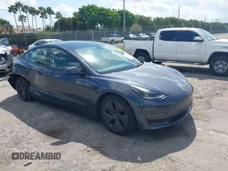 2023 Tesla Model 3 with VIN 5YJ3E1EA3PF623114, listed as a IAAI auction lot 41710385 with 31,663 mi miles. Bid and sale history available at carsss.com. Image 1.