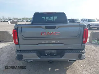 2021 GMC Sierra 1500 Denali z VIN 3GTU9FETXMG382438, wystawiony jako IAAI lot #41880365 z przebiegiem 54 651 mil mil oraz . Historia ofert i sprzedaży dostępna na DreamBid. Obrazek 17.