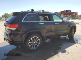2017 Jeep Grand Cherokee Overland with VIN 1C4RJFCTXHC778491, listed as a Copart auction lot 73944594 with 99,235 mi miles and Clean Title. Bid and sale history available at carsss.com. Image 3.