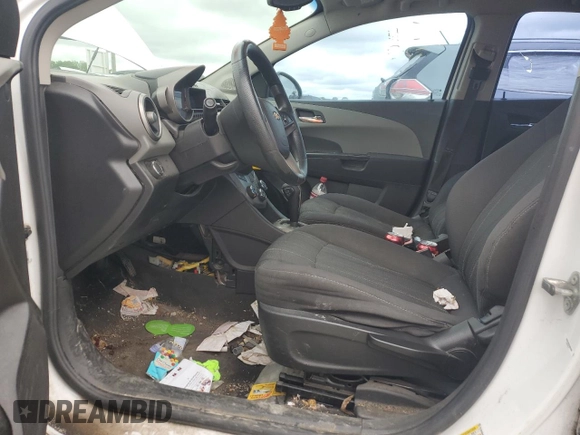 2013 Chevrolet Sonic LT with VIN 1G1JC5SH9D4137246, listed as a Copart auction lot 56001065 with 141,545 mi miles and Clean Title. Bid and sale history available at DreamBid. Image 7.
