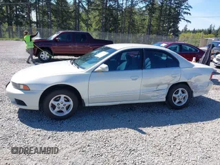 2003 Mitsubishi Galant ES z VIN 4A3AA46G63E162393, wystawiony jako IAAI lot #42184544 z przebiegiem 137 780 mil mil oraz . Historia ofert i sprzedaży dostępna na DreamBid. Obrazek 14.