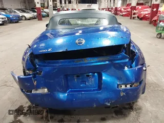 2005 Nissan 350Z Touring z VIN JN1AZ36A95M753704, wystawiony jako IAAI lot #41226946 z przebiegiem 94 351 mil mil oraz . Historia ofert i sprzedaży dostępna na DreamBid. Obrazek 6.