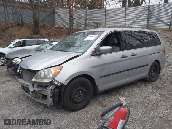 2010 Honda Odyssey LX with VIN 5FNRL3H26AB008709, listed as a IAAI auction lot 41836230 with 168,267 mi miles and . Bid and sale history available at DreamBid. Image 2.