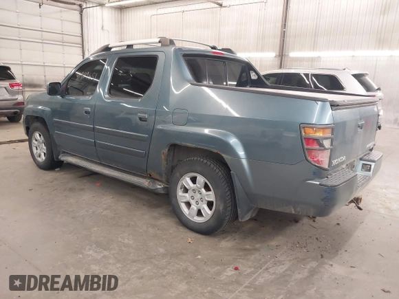 2006 Honda Ridgeline RTL with VIN 2HJYK16556H508101, listed as a IAAI auction lot 41909651 with 301,945 mi miles. Bid and sale history available at carsss.com. Image 3.