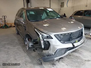 2020 Cadillac XT4 AWD Premium Luxury with VIN 1GYFZDR49LF015590, listed as a IAAI auction lot 41606564 with 47,795 mi miles. Bid and sale history available at carsss.com. Image 1.