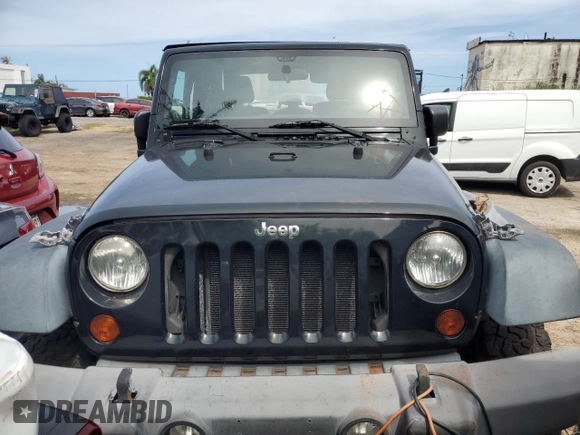 2012 Jeep Wrangler Sport with VIN 1C4AJWAG7CL258762, listed as a Copart auction lot 45012874 with Not provided miles and Non repairable. Bid and sale history available at DreamBid. Image 5.