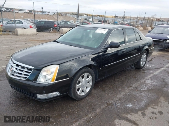 2006 Cadillac DTS w/1SC with VIN 1G6KD57Y96U251691, listed as a IAAI auction lot 41086147 with 128,959 mi miles. Bid and sale history available at carsss.com. Image 2.