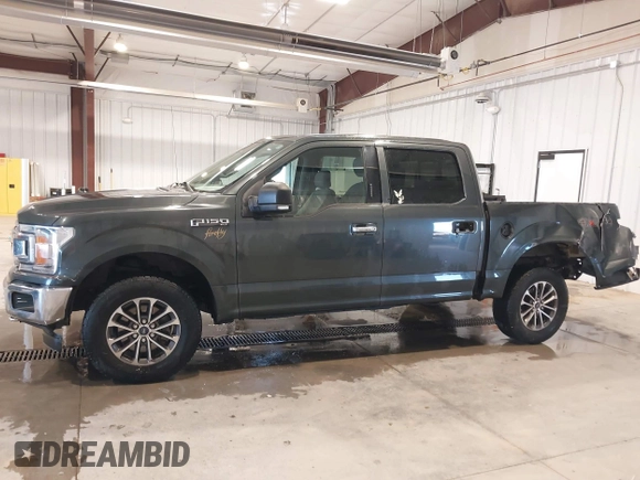 2018 Ford F-150 XL with VIN 1FTEW1EG3JKE52823, listed as a IAAI auction lot 41413009 with 142,057 mi miles. Bid and sale history available at carsss.com. Image 14.