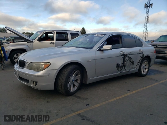 2006 BMW 7 Series 750i with VIN WBAHL83586DT05258, listed as a Copart auction lot 77033744 with 129,376 mi miles and Salvage Title. Bid and sale history available at DreamBid. Image 1.