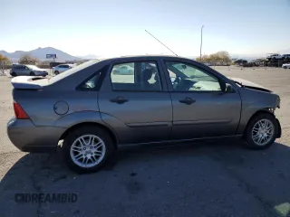 2007 Ford Focus S z VIN 1FAFP34NX7W321313, wystawiony jako Copart lot #43158235 z przebiegiem 57 299 mil mil oraz Szkoda całkowita • Salvage title. Historia ofert i sprzedaży dostępna na DreamBid. Obrazek 3.