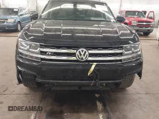 2018 Volkswagen Atlas SEL z VIN 1V2RR2CAXJC548261, wystawiony jako IAAI lot #41650478 z przebiegiem 123 399 mil mil oraz . Historia ofert i sprzedaży dostępna na DreamBid. Obrazek 6.