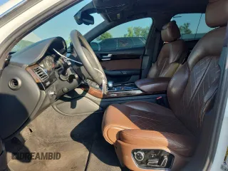 2014 Audi A8 3.0T with VIN WAURGAFD1EN002429, listed as a Copart auction lot 63762475 with 140,884 mi miles and Clean title. Bid and sale history available at DreamBid. Image 7.
