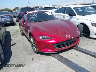 2021 Mazda MX-5 Miata Grand Touring with VIN JM1NDAM71M0459437, listed as a IAAI auction lot 41808704 with 19,368 mi miles and . Bid and sale history available at DreamBid. Image 1.