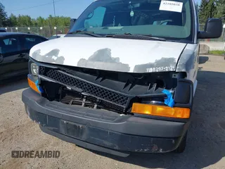 2012 Chevrolet Express Cargo Van with VIN 1GCWGFCB0C1117727, listed as a IAAI auction lot 42105038 with 204,472 mi miles. Bid and sale history available at carsss.com. Image 6.