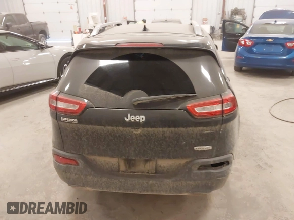 2015 Jeep Cherokee Latitude with VIN 1C4PJLCS8FW689849, listed as a IAAI auction lot 42144161 with 138,740 mi miles and . Bid and sale history available at carsss.com. Image 16.