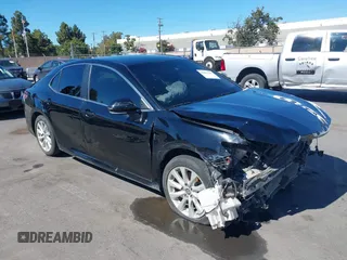 2019 Toyota Camry LE z VIN 4T1B11HK9KU847026, wystawiony jako IAAI lot #40081300 z przebiegiem 127 824 mil mil oraz . Historia ofert i sprzedaży dostępna na DreamBid. Obrazek 1.
