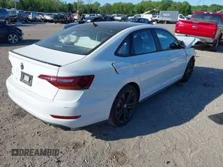 2019 Volkswagen Jetta GLI S z VIN 3VW6T7BU9KM177332, wystawiony jako IAAI lot #42197935 z przebiegiem 93 449 mil mil oraz . Historia ofert i sprzedaży dostępna na DreamBid. Obrazek 4.