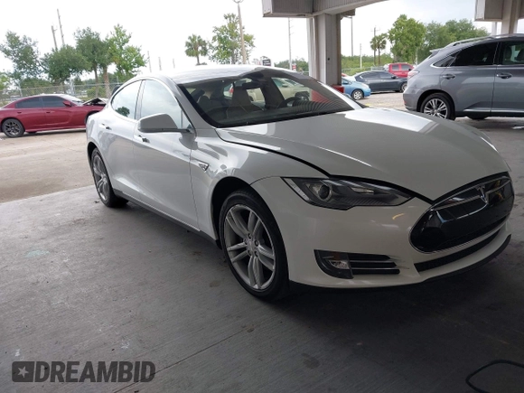 2014 Tesla Model S 60 with VIN 5YJSA1S16EFP53350, listed as a IAAI auction lot 42239753 with 104,985 mi miles and . Bid and sale history available at DreamBid. Image 1.